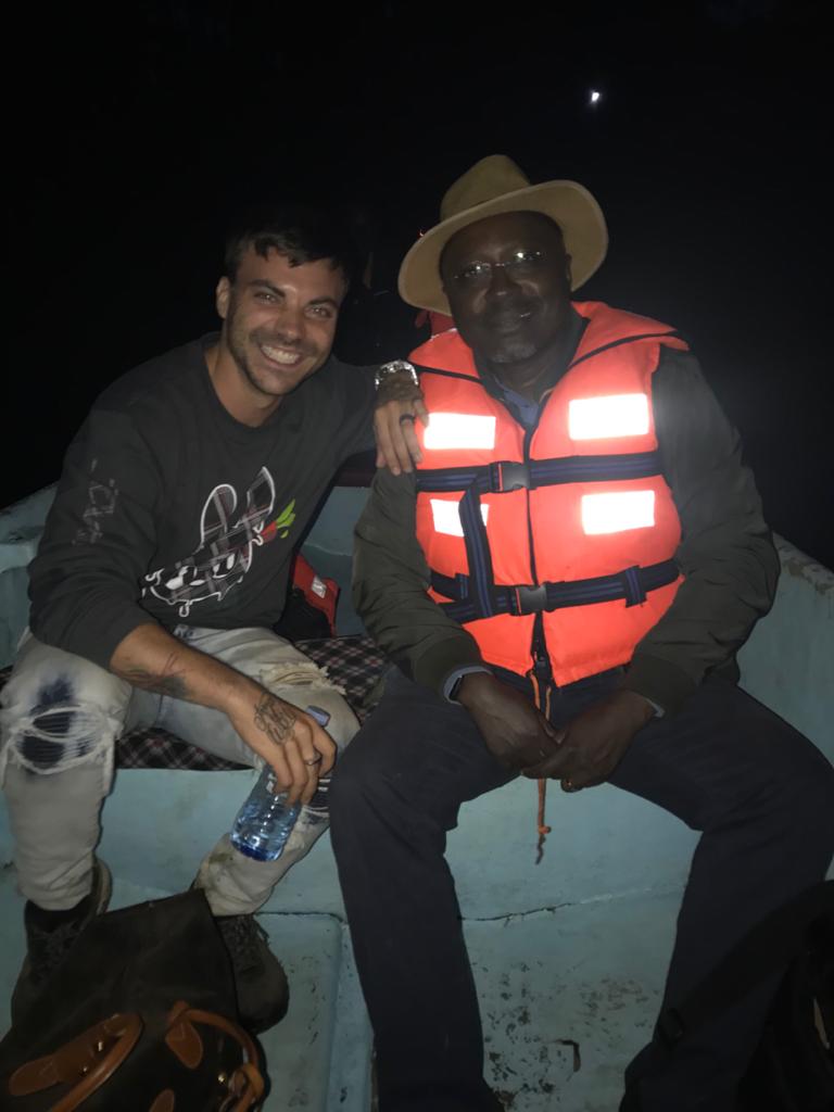 Thomas and friend on the Nile at night